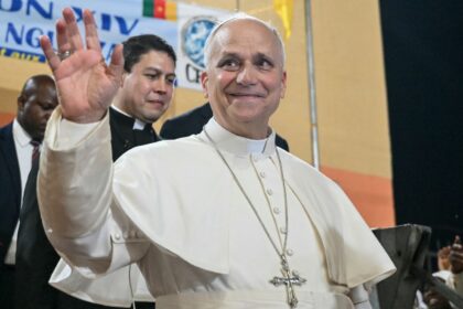 Pope Leo XIV waves to supporters as he leaves after his visit to the Ngul Zamba (Power of God) orphanage in Yaounde, Cameroon on the third day of his apostolic journey to Africa (Photo/AP)