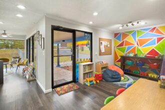 Police said that the raid uncovered children allegedly tied up and injured, with officials citing evidence of mistreatment at the childcare centre.