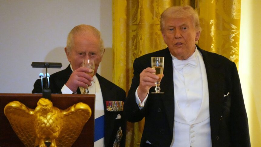 Britain's King Charles III toasts with President Donald Trump during a State Dinner with first lady Melania Trump and Queen Camilla in the East Room of the White House State Dinner