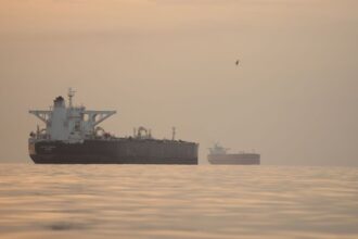Tankers anchored in the Strait of Hormuz off the coast of Qeshm Island, Iran, Saturday, April 18, 2026. (AP Photo)