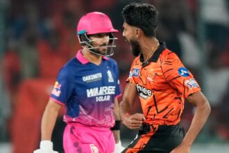 Rajasthan Royals' Praful Hinge celebrates the wicket of Rajasthan Royals' Dhruv Jurel, left, during the Indian Premier League cricket match between Sunrisers Hyderabad and Rajasthan Royals in Hyderabad, India, Monday, April 13, 2026. (AP Photo)