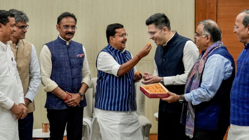 Raghav Chadha, Sandeep Pathak and Ashok Mittal with BJP president Nitin Nabin and party leaders Anil Baluni (extreme left), Tarun Chugh and Arun Singh (extreme right) at the BJP headquarters in New Delhi, Friday. (PTI)