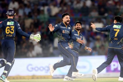 Gujarat Titans' Rashid Khan celebrates the wicket of Delhi Capitals batsman Sameer Rizvi during the IPL match between Delhi Capitals and Gujarat Titans at Arun Jaitley Stadium in New Delhi on Wednesday. (EXPRESS PHOTO BY PRAVEEN KHANNA)
