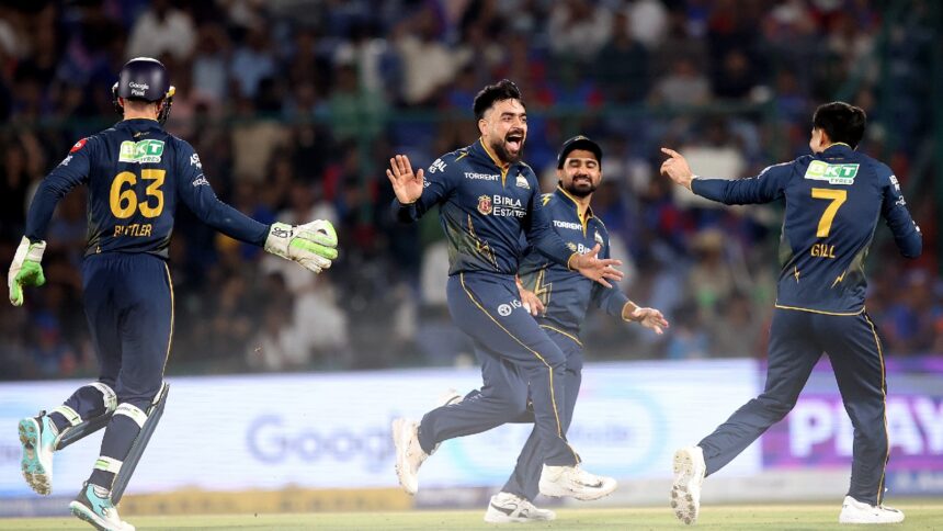Gujarat Titans' Rashid Khan celebrates the wicket of Delhi Capitals batsman Sameer Rizvi during the IPL match between Delhi Capitals and Gujarat Titans at Arun Jaitley Stadium in New Delhi on Wednesday. (EXPRESS PHOTO BY PRAVEEN KHANNA)