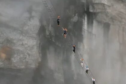 Explore China’s thrilling Sky Ladder—a hanging ladder spanning 551 feet, 5,000 feet above ground in Zhangjiajie Nature Park