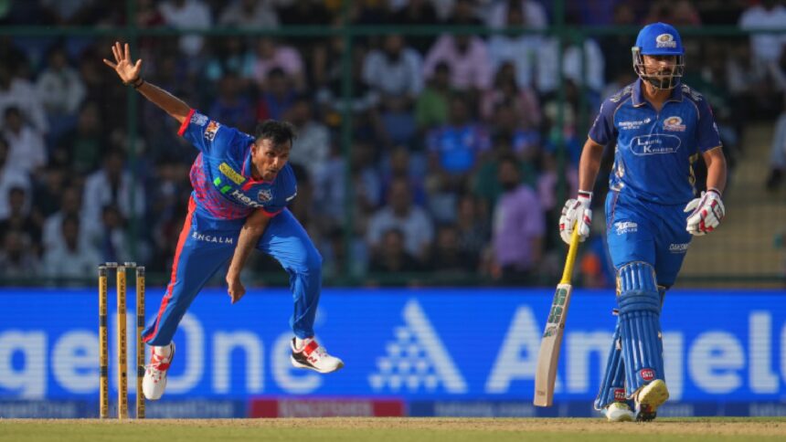 Delhi Capitals' T. Natarajan bowls a delivery during the Indian Premier League cricket match between Delhi Capitals and Mumbai Indians in New Delhi, India, Saturday, April. 4, 2026. (AP Photo)