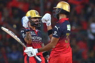 Royal Challengers Bengaluru's Virat Kohli celebrates his fifty runs with batting partner Devdutt Padikkal during the Indian Premier League cricket match between Royal Challengers Bengaluru and Gujarat Titans in Bengaluru, India, Friday, April 24, 2026. (AP Photo)