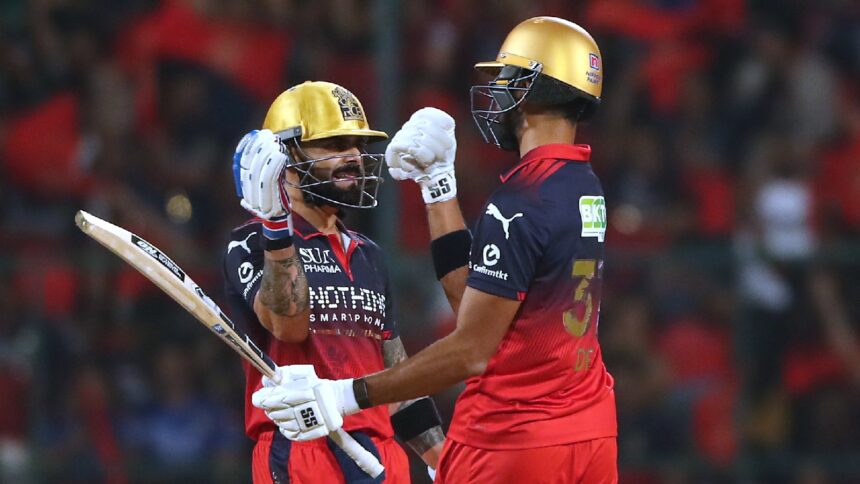IPL 2026 Points Table Update: Virat Kohli celebrates his fifty with Devdutt Padikkal during the Indian Premier League cricket match between Royal Challengers Bengaluru and Gujarat Titans. (AP Photo)
