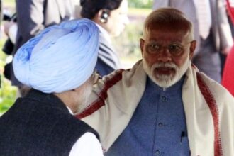 Prime Minister Narendra Modi with former PM Manmohan Singh at the event | Praveen Jain/ThePrint
