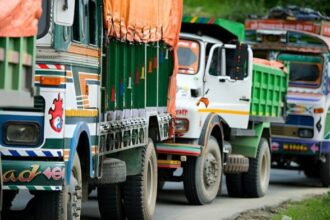 Trucks lined up on a road