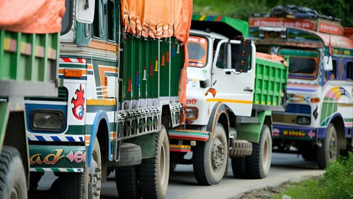Trucks lined up on a road