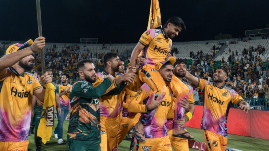 Peshawar Zalmi captain and top scorer Babar Azam is hoisted in the air by his teammates as they celebrate their PSL title. (Photo: PSL Media)