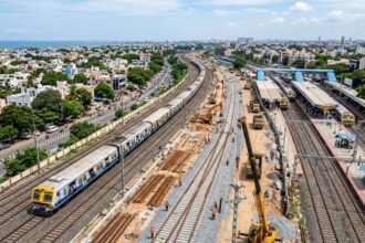Indian Railways has approved a Rs 993 crore rail line doubling project to improve Chennai suburban train operations. (Image generated using AI)