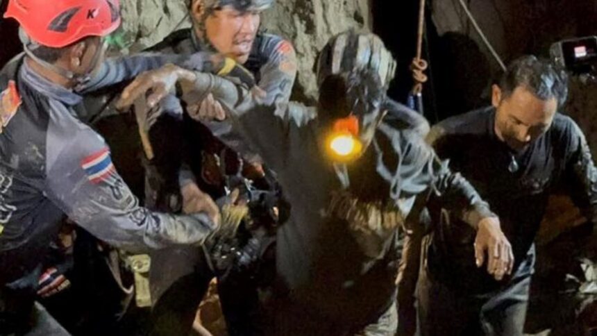 This image released by Metta Tham Rescue Kalasin, Rescuers evacuate the first of five villagers, center, who had been trapped in a cave in Xaisomboun province, Laos, Friday, May 29, 2026. (Metta Tham Rescue Kalasin via AP)