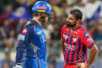 Lucknow Super Giants' Mohammed Shami, right, reacts after Mumbai Indians' Ryan Rickelton hits a boundary during the Indian Premier League cricket match between Mumbai Indians and Lucknow Super Giants in Mumbai on Monday. (AP Photo)