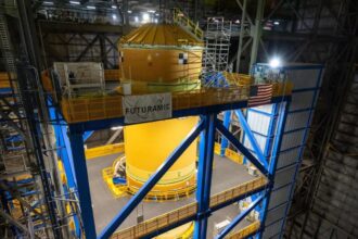 The SLS core stage itself is enormous, standing about 212 feet tall and housing the rocket’s four main engines. (Image: Nasa)