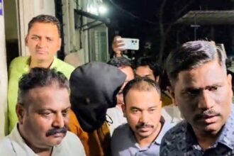Nashik [Maharashtra], May 12 (ANI): The accused, Shubham Khairnar, being taken into custody by the CBI officials from the Nashik Crime Branch Unit-2 office in connection with the alleged NEET-UG 2026 paper leak, in Nashik on Tuesday. (ANI Video Grab)