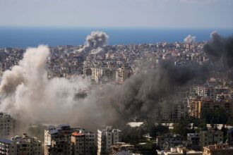 Smoke rises following several Israeli airstrikes that hit without previous warning Beirut's southern suburbs and central Beirut, Lebanon. (AP Photo)