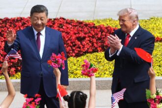 President Donald Trump and China's President Xi Jinping greet children during a welcome ceremony at the Great Hall of the People, Thursday, May 14, 2026, in Beijing. (AP Photo)
