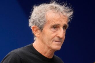 Former F1 driver Alain Prost arrives before the third free practice at the Monaco racetrack in Monaco, May 25, 2024, ahead of the Monaco Grand Prix Formula One race. (AP Photo)