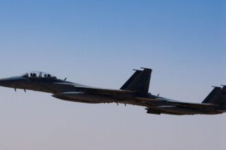 A Saudi fighter jet accompanies Air Force One, carrying US President Donald Trump, on approach to the King Khalid International Airport in Riyadh, Saudi Arabia, May 13, 2025. (REUTERS)