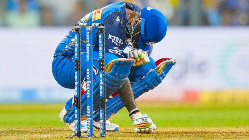 File image of Mumbai Indians' Suryakumar Yadav reacting after being hit by a ball during the Indian Premier League cricket match between Mumbai Indians and Chennai Super Kings in Mumbai. (AP Photo)