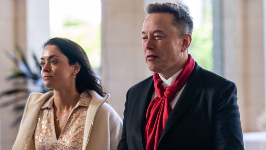 Elon Musk and Shivon Zilis arrive to the wedding of White House Deputy Chief of Staff Dan Scavino and Erin Elmore, at President Donald Trump’s Mar-a-Lago club in Palm Beach, Fla., on Sunday, Feb. 1, 2026.