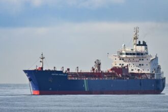 The full reopening of the Strait has been delayed by the deadlock between the US and Iran.