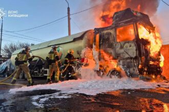 In this photo, provided by the Ukrainian Emergency Service, emergency services personnel work to extinguish a fire a vehicle following a Russian drone attack in Kyiv region, Ukraine, on May 5, (AP photo)