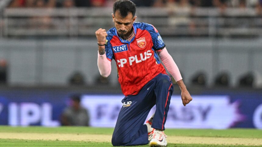 Punjab Kings' Yuzvendra Chahal celebrates the wicket of Rajasthan Royals' captain Riyan Parag during the Indian Premier League cricket match between Rajasthan Royals and Punjab Kings in New Chandigarh, India, Tuesday, April 28, 2026.(AP Photo)