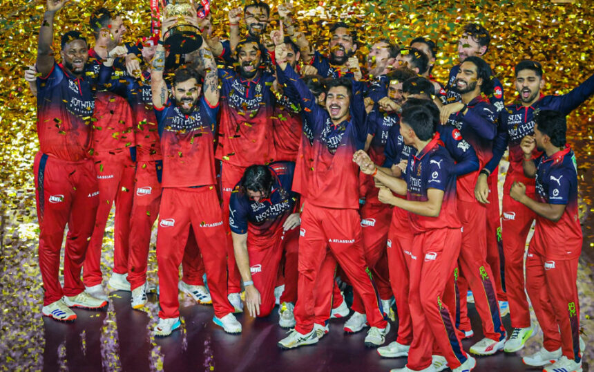 RCB lifting trophy