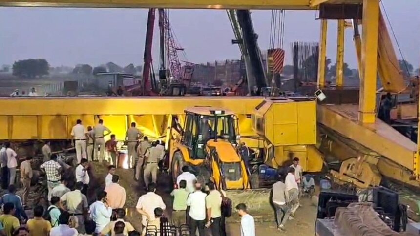 A crane overturned during the construction of the Jewar Airport flyover near Pahneda Khurd, in Faridabad on Thursday. Rescue operations are ongoing. (ANI Video Grab)
