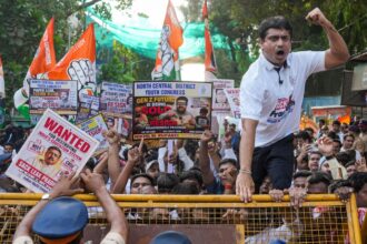 Mumbai: IYC President Uday Bhanu Chib scales a barricade as he along with party workers take out a protest march, from Chaityabhoomi in Dadar to Shivaji Park, against the alleged NEET paper leak and concerns regarding the OSM system in CBSE’s board examinations, in Mumbai, Tuesday, June 2, 2026. (PTI Photo/Shashank Parade)(PTI06_02_2026_000255A)