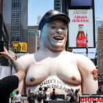 A giant inflatable caricature of Elon Musk stands in Times Square criticizing Grok, the artificial intelligence chatbot developed by xAI, in New York City, on June 11, 2026. (REUTERS)