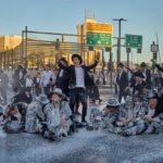 Israeli mounted police disperse Ultra-Orthodox Jews blocking a road during a protest against the army draft in Jerusalem