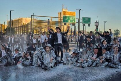 Israeli mounted police disperse Ultra-Orthodox Jews blocking a road during a protest against the army draft in Jerusalem