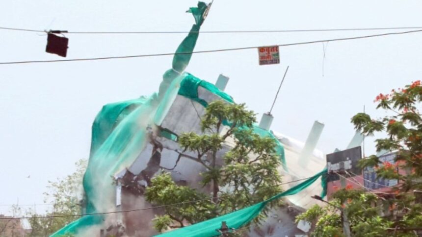 Jaipur, Jun 08 (ANI): Jaipur Development Authority (JDA) carries out an anti-encroachment drive in Jagatpura for the widening of the road running parallel to the railway line, in Jaipur on Monday. (ANI Photo)