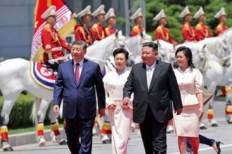 Chinese President Xi Jinping, and his wife Peng Liyuan, accompanied by North Korean leader Kim Jong Un, second right, and his wife his wife Ri Sol Ju attend a welcome ceremony in Pyongyang (PTI)