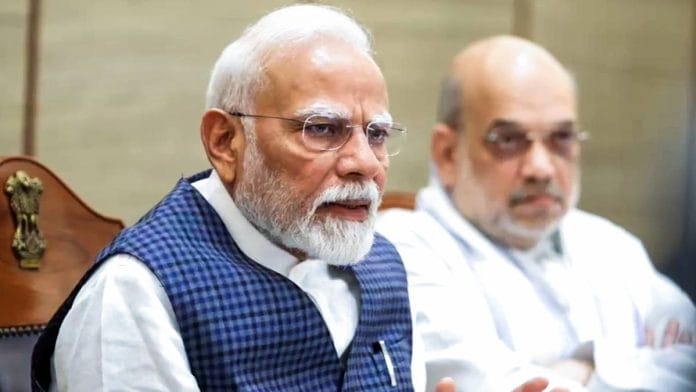 Prime Minister Narendra Modi with home minister Amit Shah at a cabinet meeting in New Delhi | Photo: ANI