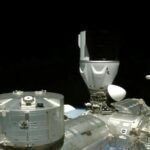 In this image from NASA TV, a SpaceX capsule carrying four astronauts docks at the International Space Station Friday, March 3, 2023. A new crew arrived at the International Space Station on Friday for a six-month mission, after overcoming trouble with one of the capsule’s docking hooks. (NASA TV via AP)
