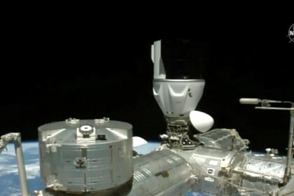 In this image from NASA TV, a SpaceX capsule carrying four astronauts docks at the International Space Station Friday, March 3, 2023. A new crew arrived at the International Space Station on Friday for a six-month mission, after overcoming trouble with one of the capsule’s docking hooks. (NASA TV via AP)