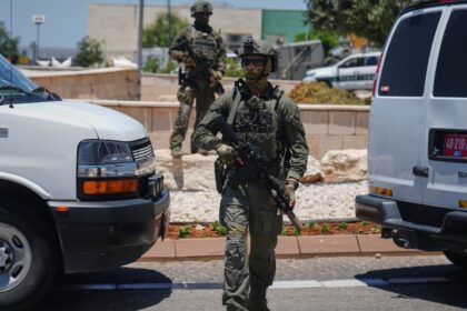 Israeli security forces are deployed at the scene of a shooting attack carried out by a Palestinian citizen of Israel near Tzur Yitzhak in central Israel, Sunday, June 7, 2026. (AP Photo)