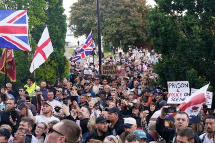 People gather to protest outside Southampton police station, Southampton, England, Tuesday June 2, 2026, after the fatal stabbing of Henry Nowak, a British teenager who was handcuffed despite claiming he was the crime victim.