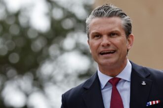 US Defense Secretary Pete Hegseth delivers a speech at the US cemetery to commemorate the 82nd anniversary of the D-Day landings, in Colleville-sur-Mer, Normandy, France, Saturday, June 6, 2026. (AP Photo)