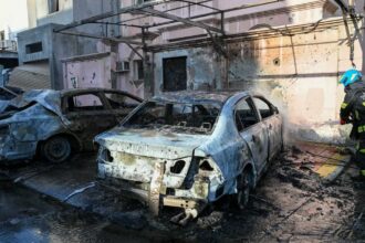Vehicles caught fire and houses were damaged in Bahrain due to falling debris of drones interception. (X/@moi_bahrain)