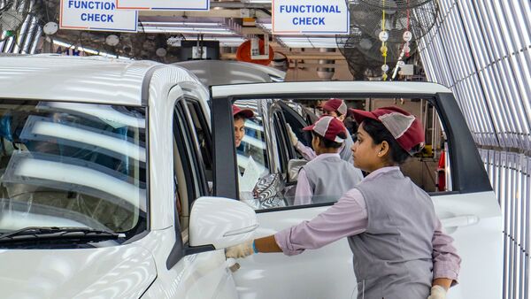 Gurugram: Women employees during the quality control, functional checks and appearance checks of vehicles, at the Maruti Suzuki facility, in Gurugram, Friday, March 27, 2026. (PTI Photo) (PTI03_27_2026_000284A)
