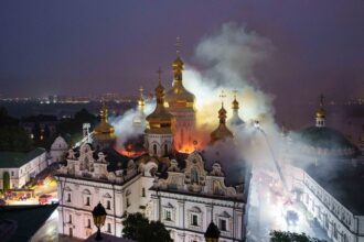Rescue workers try to put out a fire at the Dormition Cathedral of thousand-year-old Monastery of Caves, also known as Kyiv Pechersk Lavra, following a Russian strike on Kyiv, Ukraine. (AP Photo)