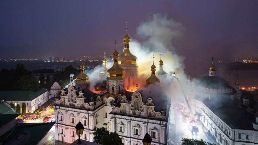Rescue workers try to put out a fire at the Dormition Cathedral of thousand-year-old Monastery of Caves, also known as Kyiv Pechersk Lavra, following a Russian strike on Kyiv, Ukraine. (AP Photo)