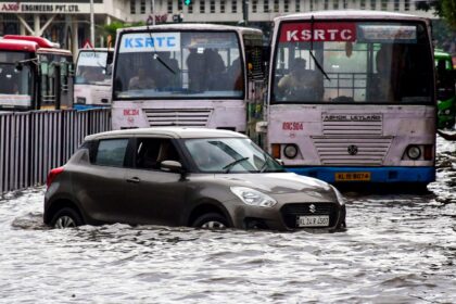 Thiruvananthapuram: Vehicles wade through a waterlogged road after rainfall, in Thiruvananthapuram, Kerala, Saturday, May 30, 2026. (PTI Photo)