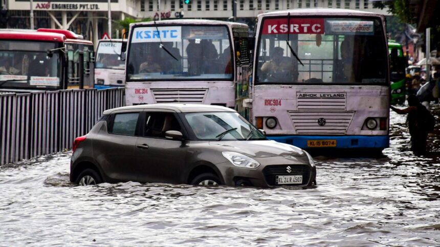 Thiruvananthapuram: Vehicles wade through a waterlogged road after rainfall, in Thiruvananthapuram, Kerala, Saturday, May 30, 2026. (PTI Photo)